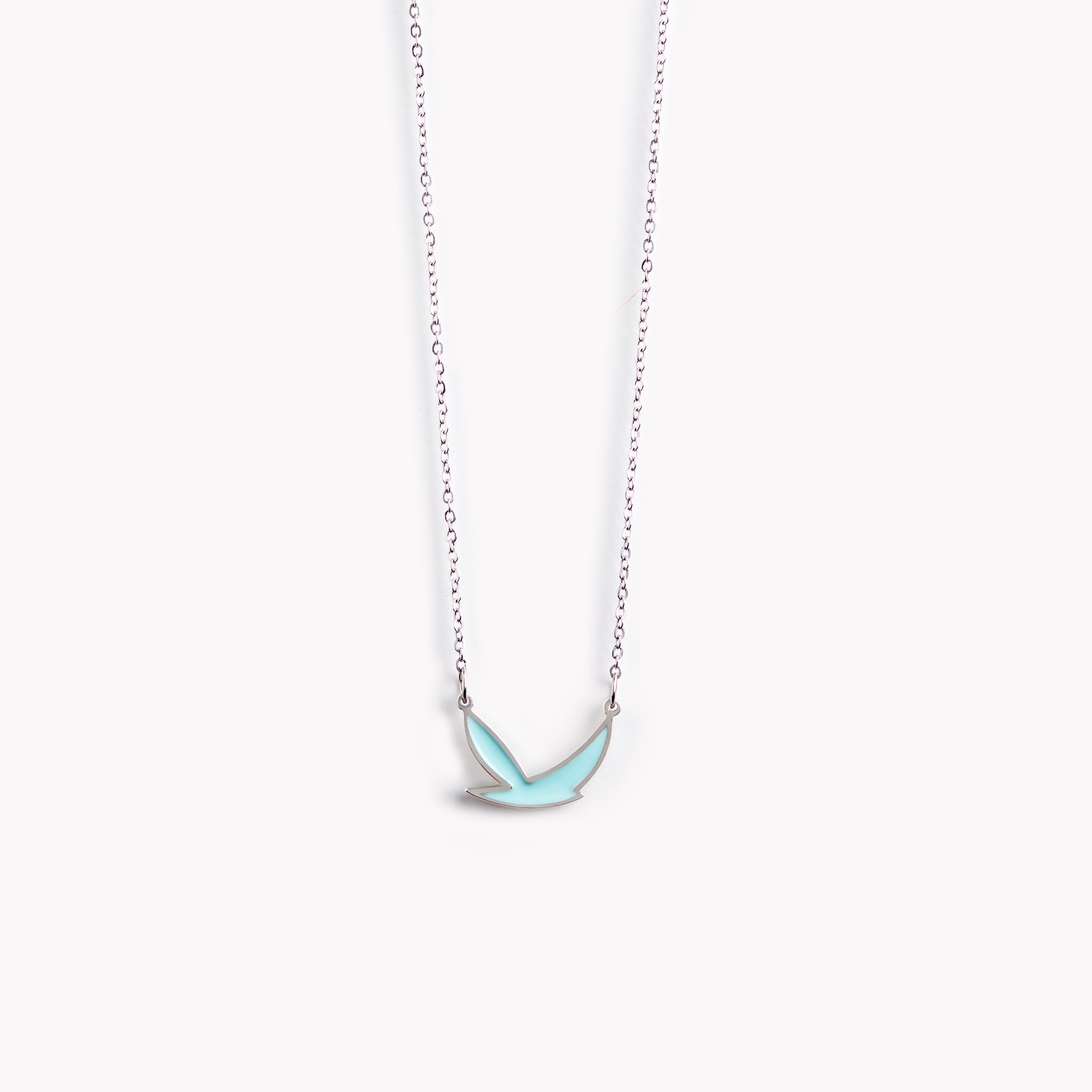 A simple, stylish, and dynamic turquoise bird necklace.