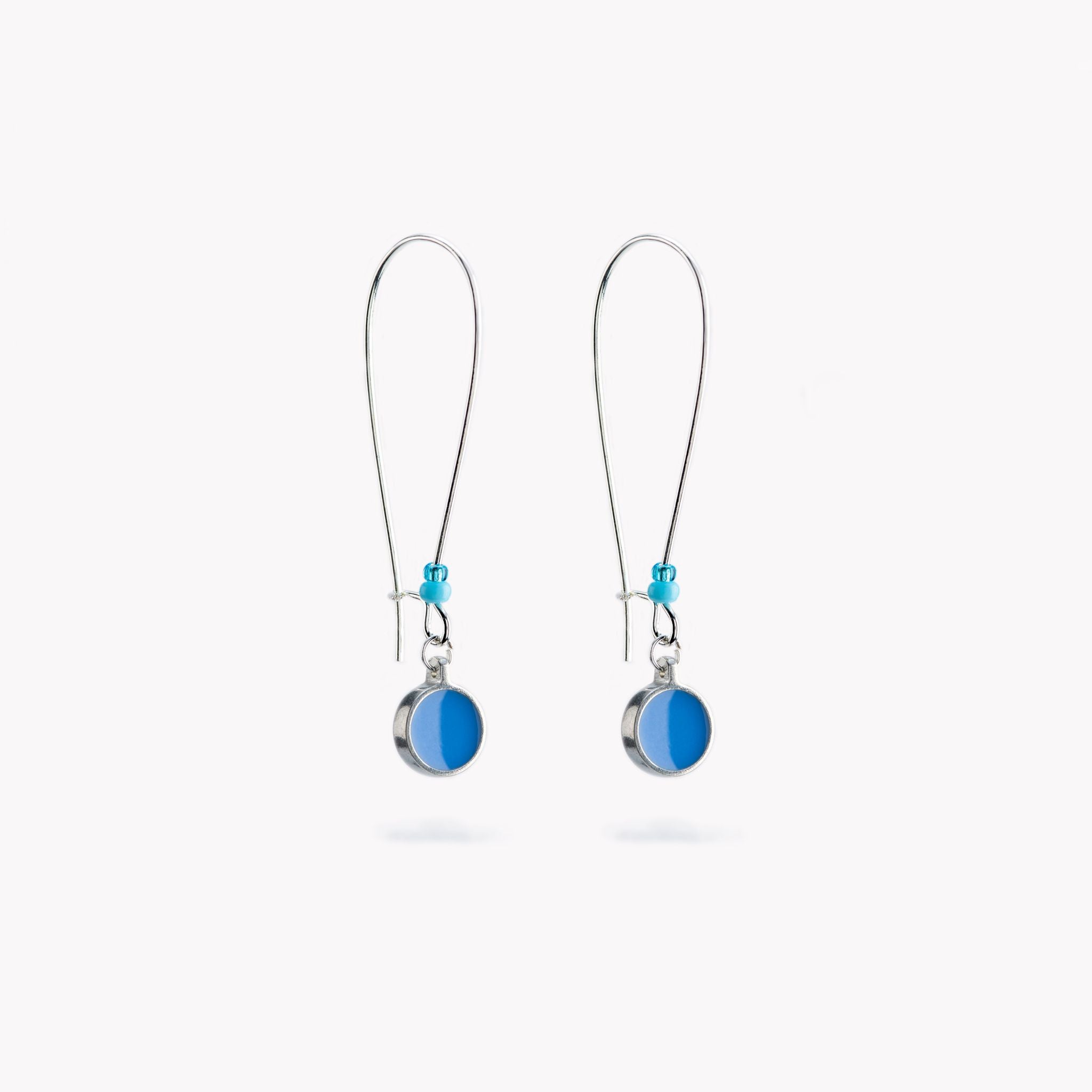 blue pair of simple, delicate circular drop earrings