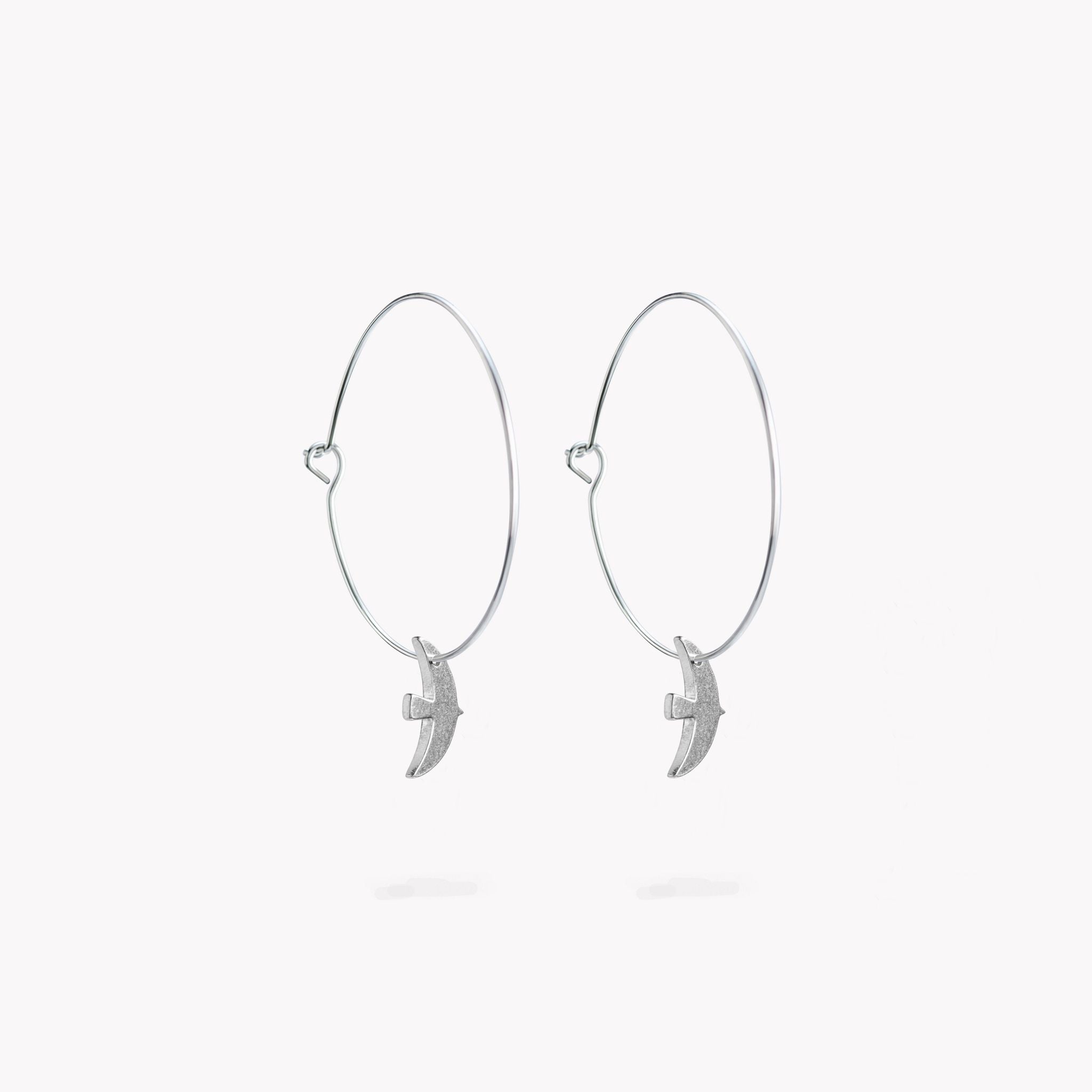A stylish & dynamic pair of hoop earrings with a simple pewter bird design.