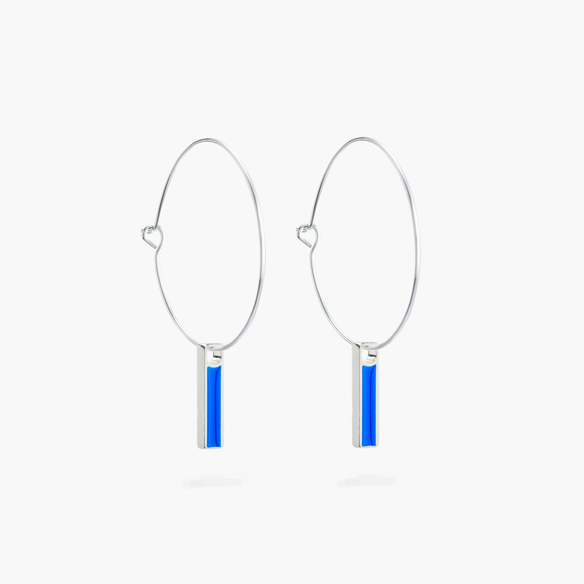 A simple pair of hoop earrings with a hanging blue bar.