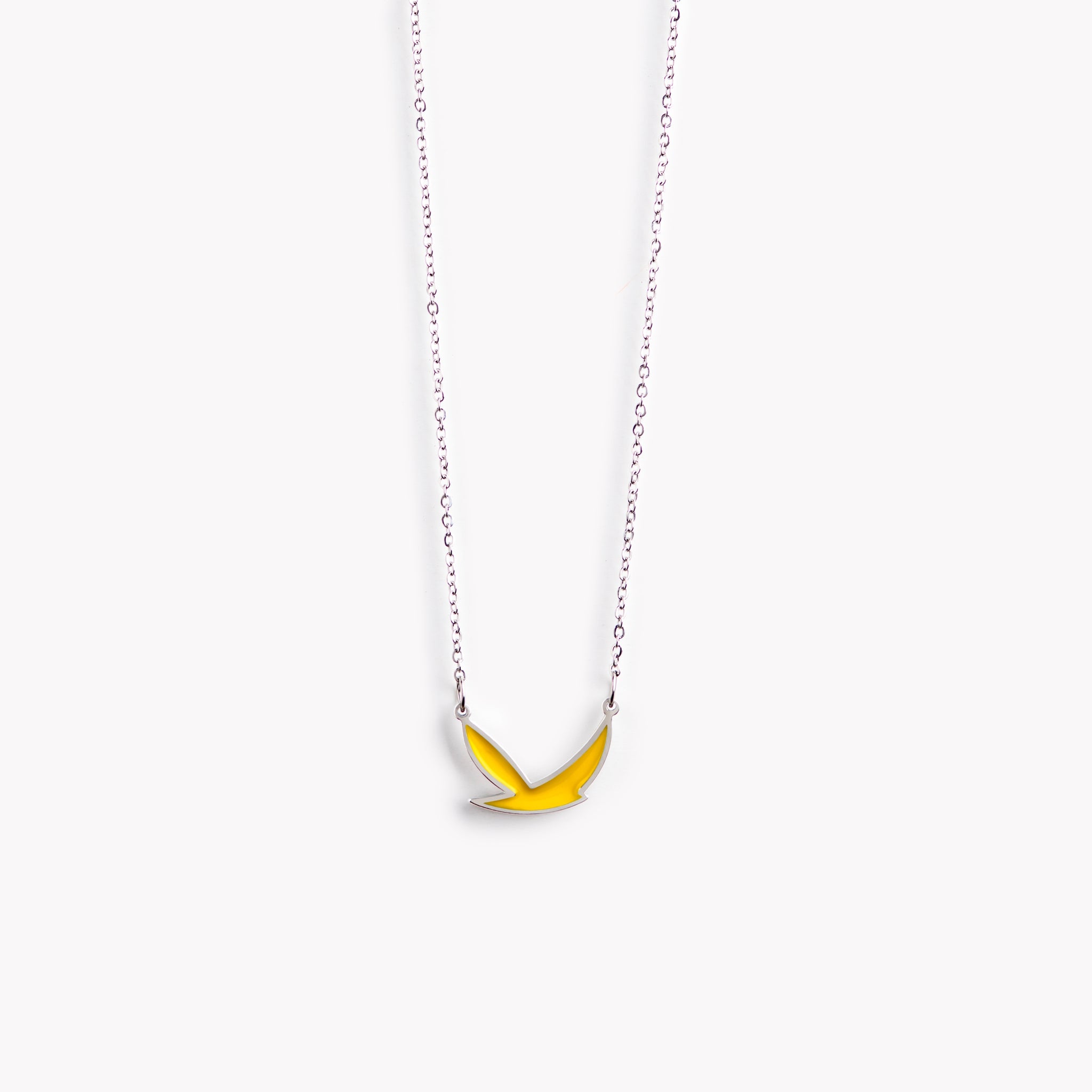 A simple, stylish, and dynamic yellow bird necklace.