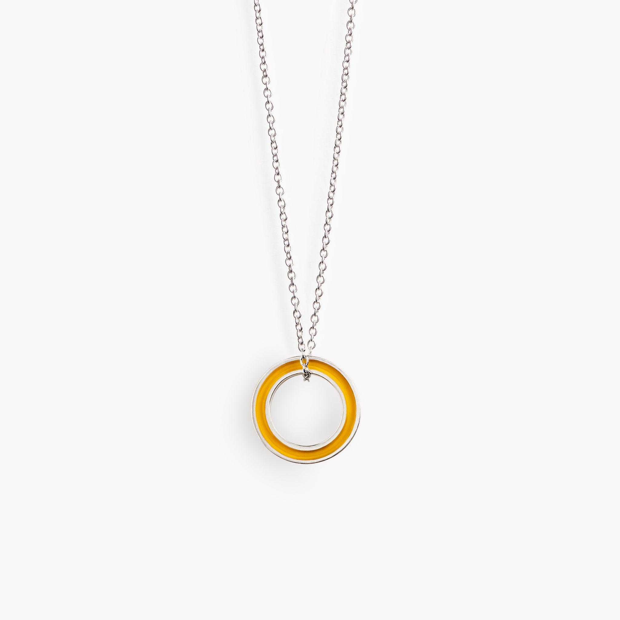 A simple yellow circular necklace on a fine steel trace chain.